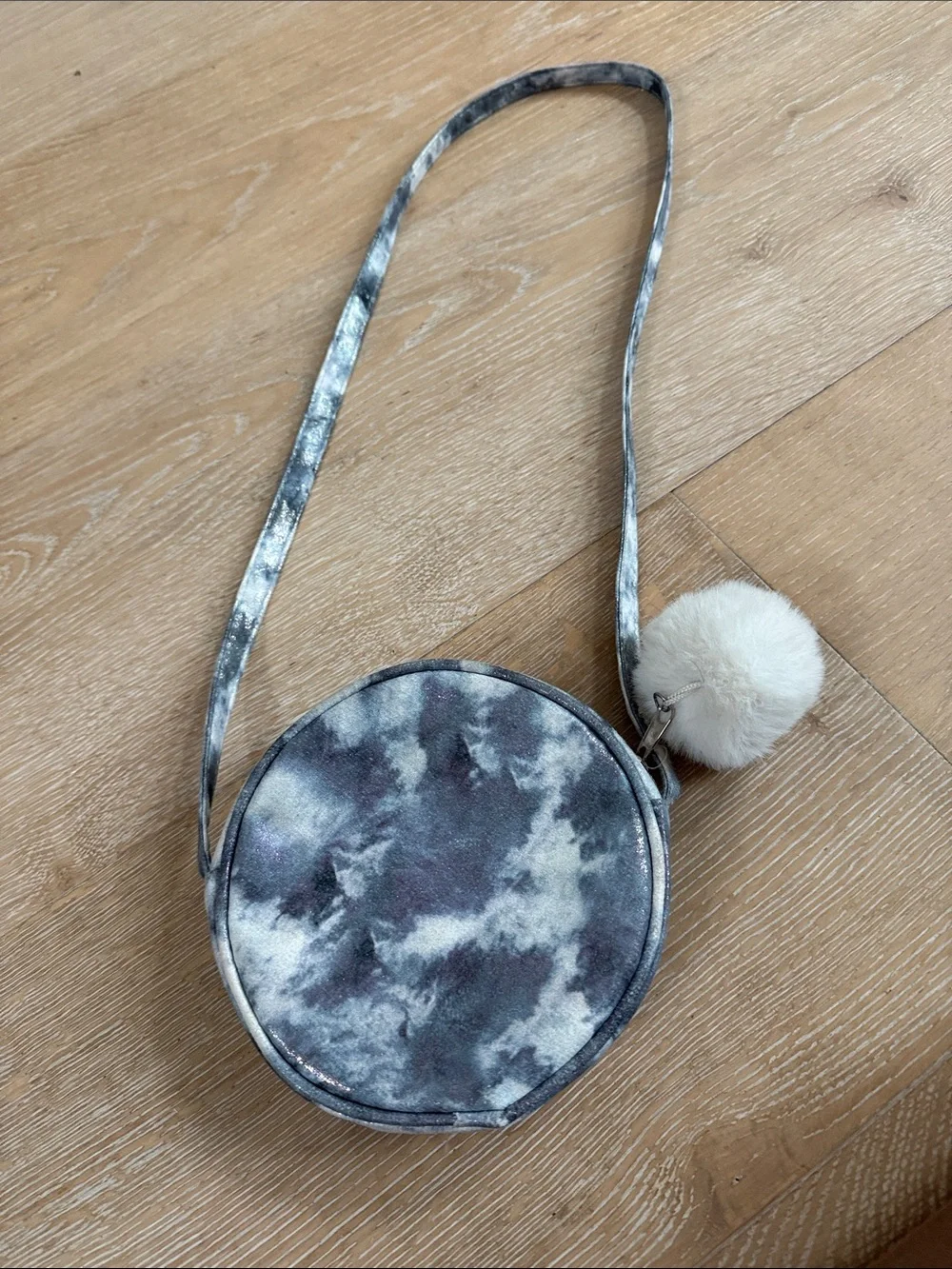 Bebe Quilted Round Crossbody Bag in Silver Gray with Pom Pom